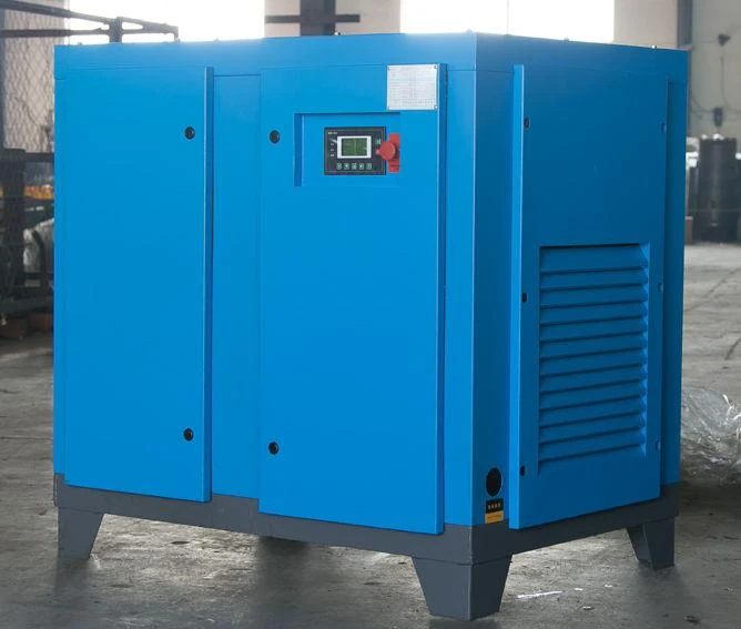 Blue stationary electric screw compressor photographed in a workshop.